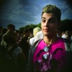 the boy in the purple shirt