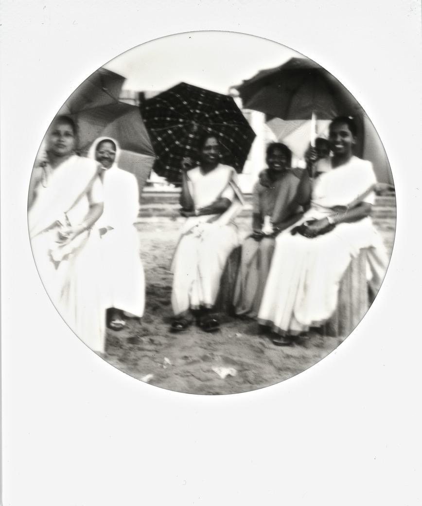 Ladies on the Beach in Puri Seeking Shelter From the Sun
