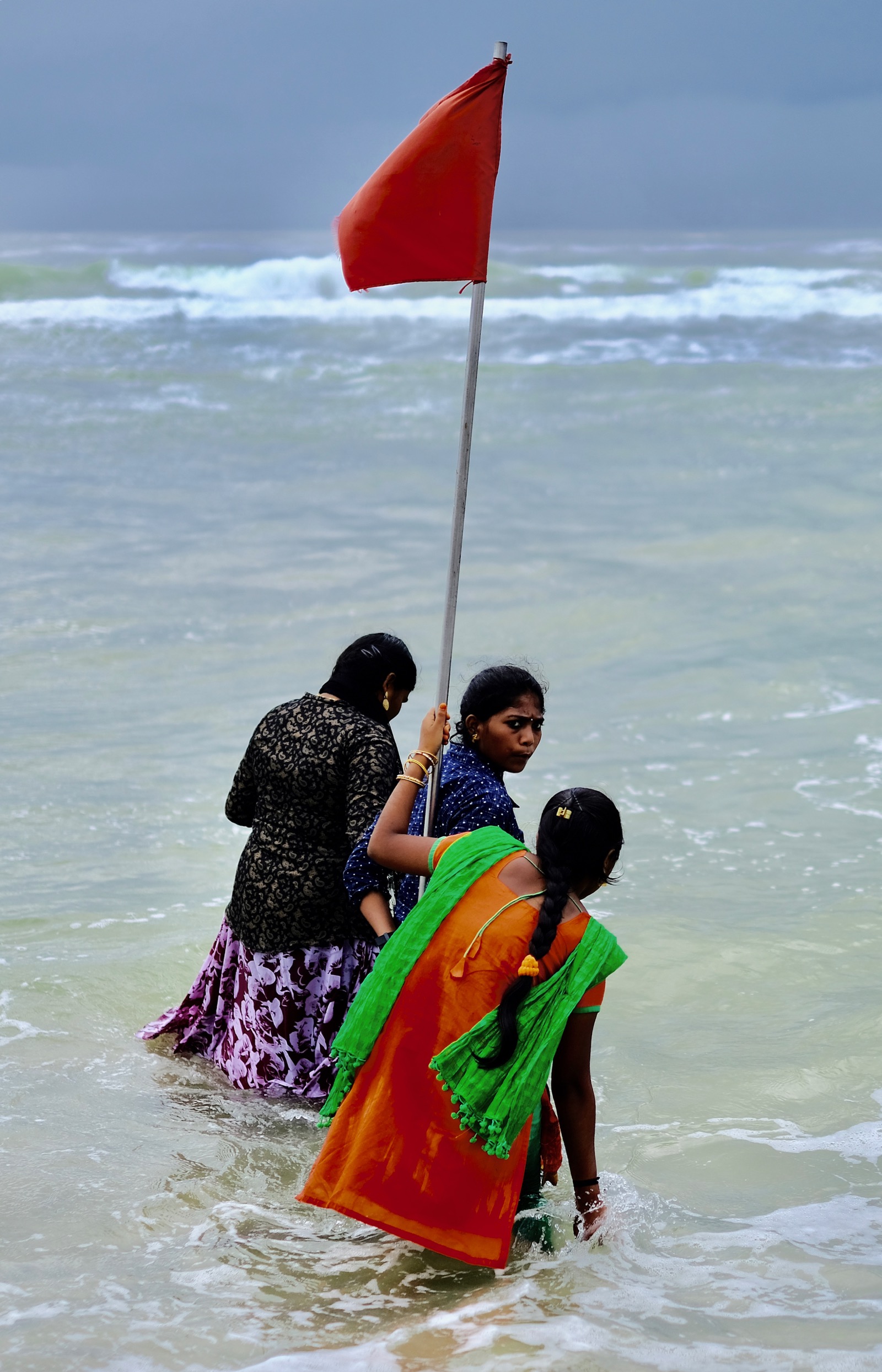 Ladies in a Stormy Sea in Kovalam