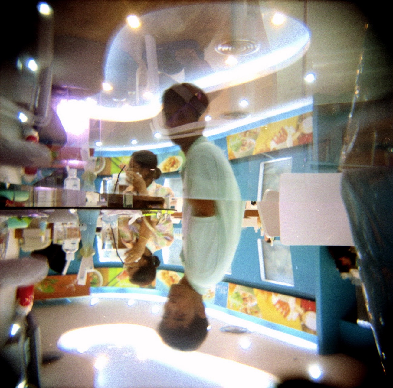 Man in Fish Diner. Bangkok 2005